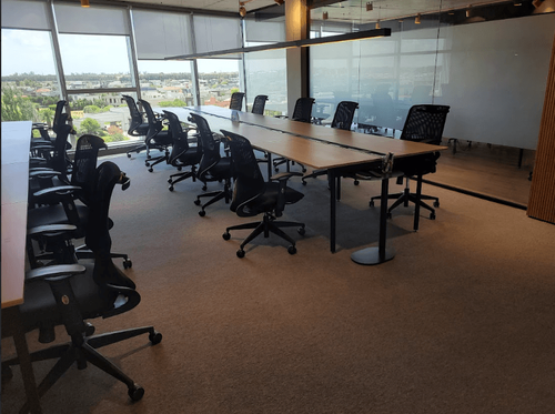 Minimalist Boardroom With Floor-To-Ceiling Windows for Meetings