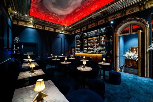 Sophisticated Jazz Lounge With Plush Seating and Statement Lighting for Exclusive Client Nights