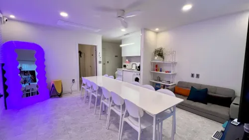 Compact Geometric Studio With Kitchenette and Lounge for Team Sessions