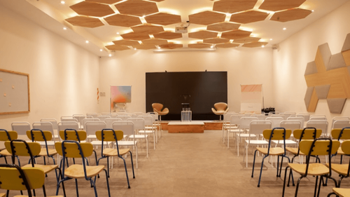 White Modern Room With Customisable Lighting for Innovative Seminars