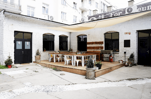 White Brick Venue With Elevated Outdoor Patio for Casual Events