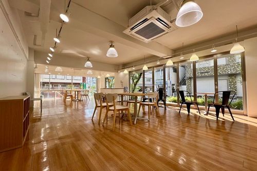 Street-Facing Glass Venue With Warm Wood Interiors for Exhibitions and Pop-Ups
