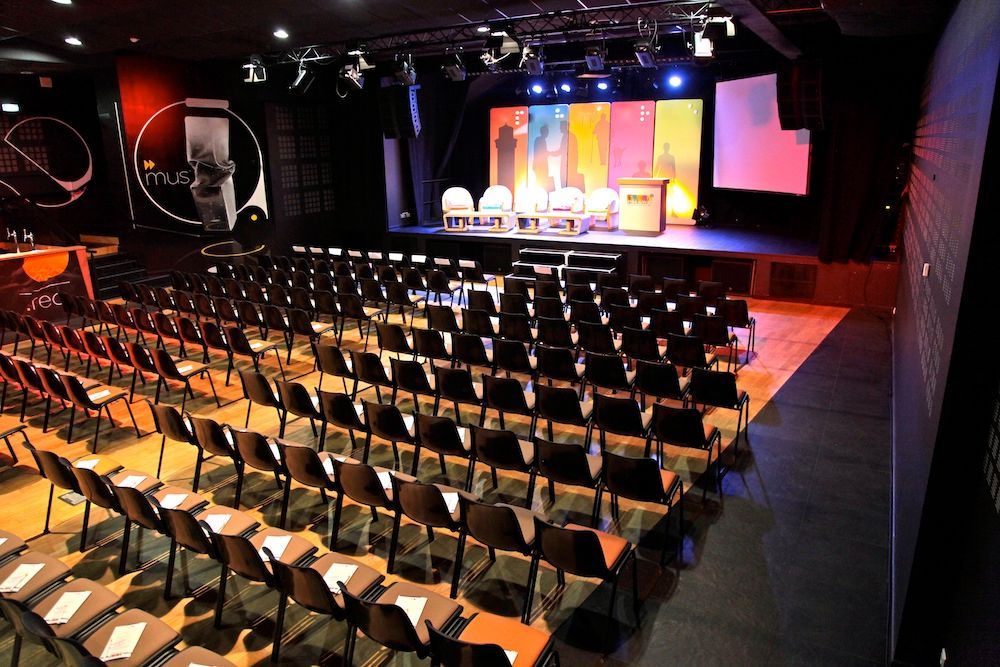 Dynamic auditorium in Paris with futuristic vibes.jpg