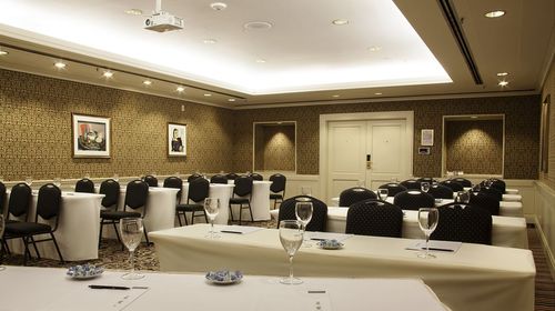 Classic Meeting Hall With Patterned Wallpaper for Conferences