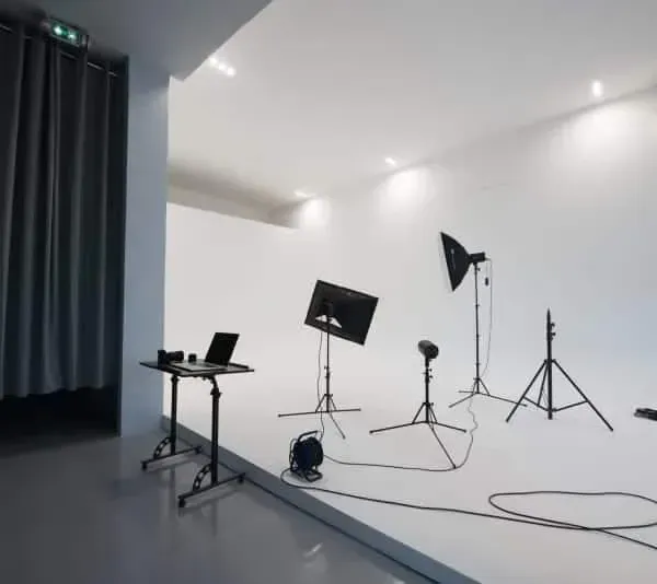 All-white modern studio with pristine features in Paris.webp
