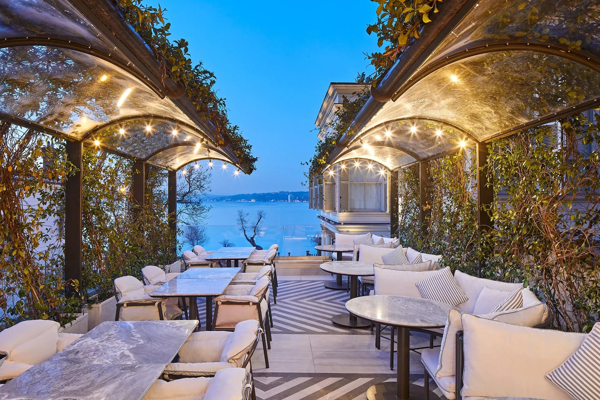 A small party hall in an elegant Ottoman glasshouse with exquisite decor.webp