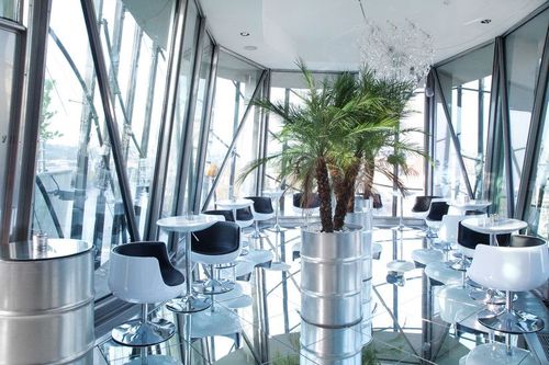 Futuristic Glass Bar With Stunning City Views for Exclusive Mixers