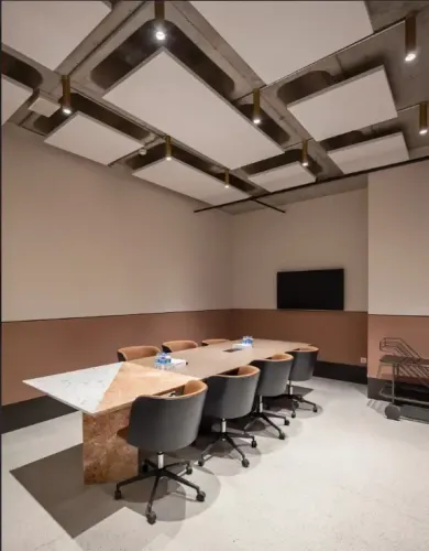 Industrial Minimalist Marble-Topped Boardroom With Exposed Ceilings for Executive Meetings