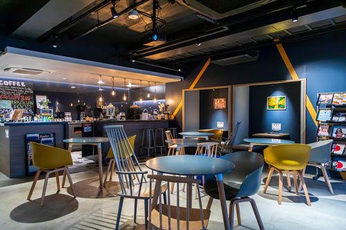 Deep Blue Social Nook With Playful Edges for Vibrant Networking Events
