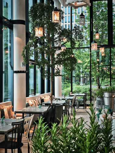 Charming Glasshouse With Lush Greenery for Casual After-Work Events