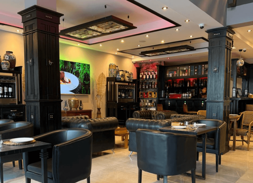 Velvet Lounge With Marble Floors and Sleek Bar for Receptions