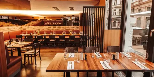 Chic Wood-Accented Restaurant With Gallery and Bar for Group Celebrations