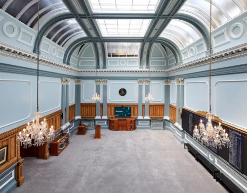 Skylit Neoclassical Hall With Adjoining Atrium for High-Level Executive Talks