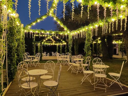 Enchanted Garden With Floral Iluminated Casettes for Private Gatherings