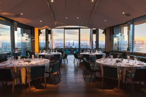 Cityview Glass Lounge With Sunset Ambience for Sophisticated Gatherings