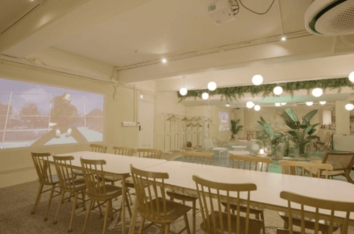 Chic Coastal Event Venue With Glowing Colours and Beachy Vibes Interior