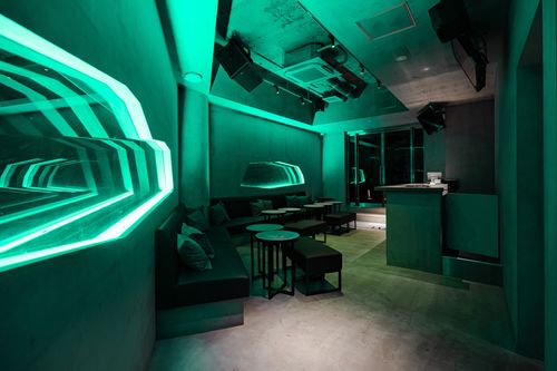 Teal-Illuminated Micro-Lounge With an Urban Terrace for Trendy Pop-Ups