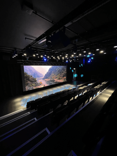 Contemporary Auditorium With Full-Width LED Screen for Presentations