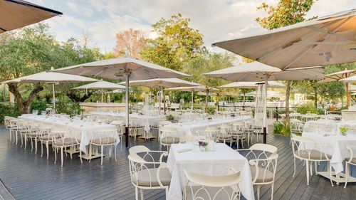 Charming Alfresco Spot With Shaded Seating for Social Events