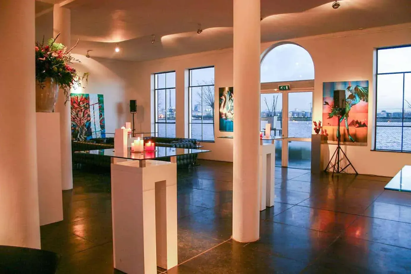 Luminous art gallery in Amsterdam with breathtaking canal views.webp