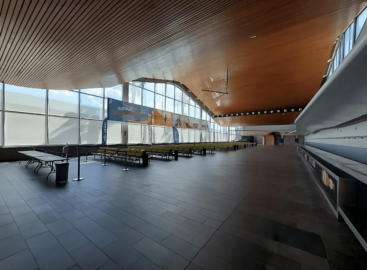 Expansive Industrial Atrium With Sculptural Wooden Ceilings for ...