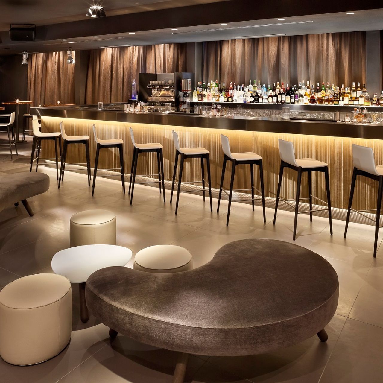 A small private event space in a sleek cocktail bar with a modern ambience.jpg
