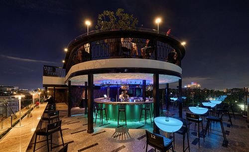 Elevated Circular Bar With Sophisticated Lighting for Launches and Parties