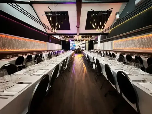 Elegant Dark-Toned Banquet Hall for Corporate Events and Celebrations