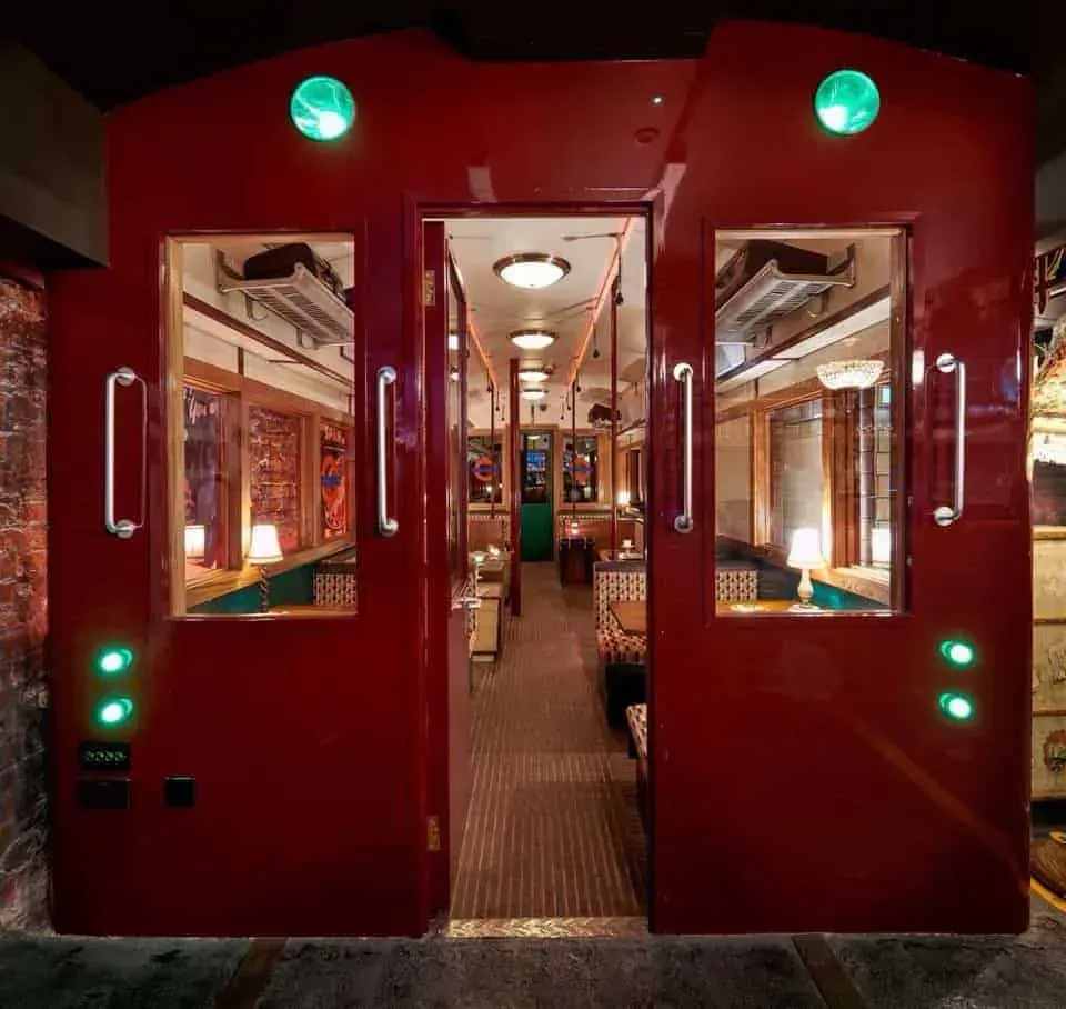 A vintage bar in London in a tube carriage.webp
