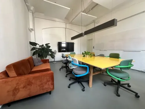 Bright Boardroom With Colourful Furniture for Intimate Meetings
