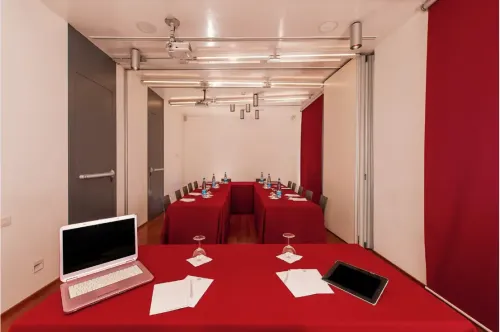 Sleek Meeting Room With Bold Red Accents for Focused Presentations