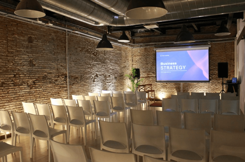Minimalistic-Industrial Meeting Room for Focused Seminars and Workshops