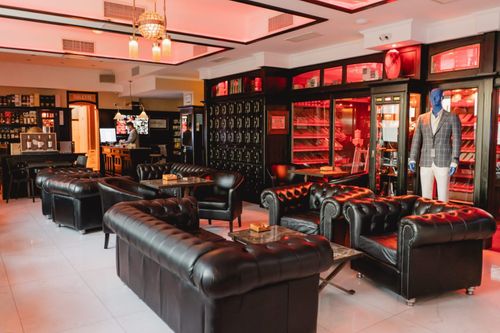 Leather Lounge With Dark Wood Finishes for Corporate Receptions