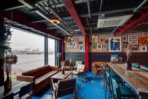 Industrial Bar With River Views for Relaxed Socials