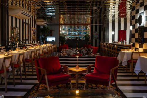 Elegant and Vibrant Red-Themed Venue for Sophisticated Private Events