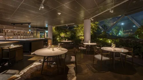 Modern Glass Dome Restaurant with Lush Greenery for Upscale Events