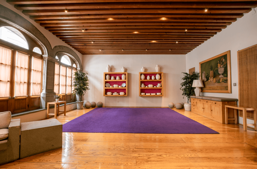 Brutalist-Timber Salon With Arched Colonial Windows