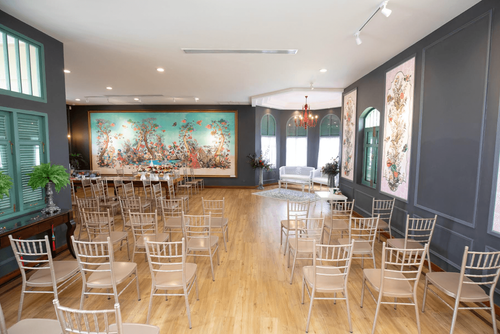 Charming Event Venue With Wooden Interiors and Artistic Decor