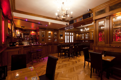 Elegant Victorian Bar Room With Classic Wood Interiors for Exclusive Cocktail Parties