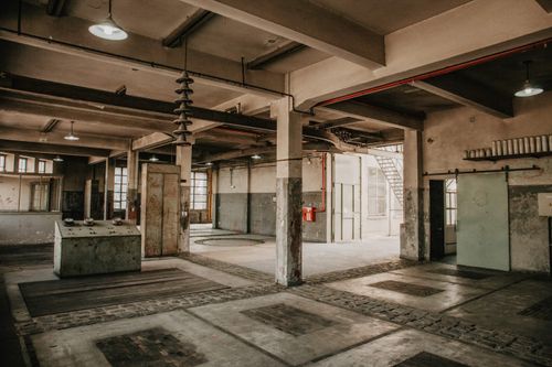 Dystopian Factory With Machinery Relics for High-Impact Events
