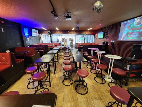 Retro-Inspired Sports Bar Lounge for After-Work Celebrations