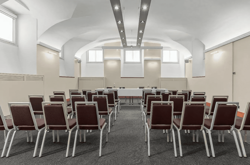 Vaulted Neo-Rationalist Hall for Corporate Talks & Training