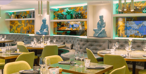Terraced Restaurant Lounge With Buddha Sculptures & Emerald Marble Interiors
