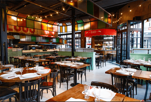 Lively Grill Restaurant with Colourful Industrial Design for Gatherings