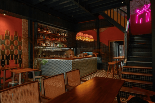 Heritage-Chic Asian Venue with Bold Murals and Neon Flair for Intimate Gatherings and Events