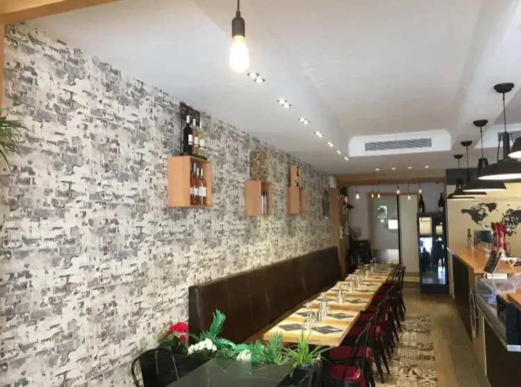 A chic French brasserie with signature wines for an intimate party.webp