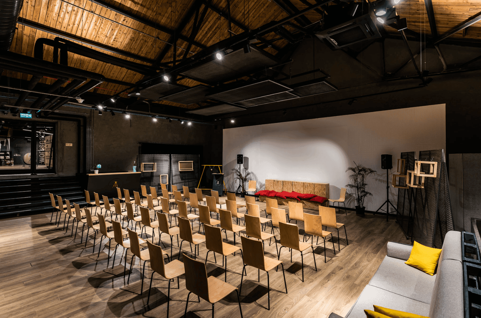 A versatile warehouse venue for hire with industrial charm.png