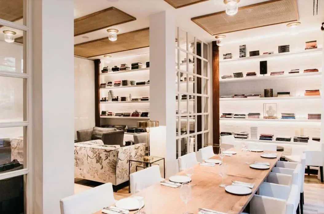 Rent a party venue in a chic library lounge.webp