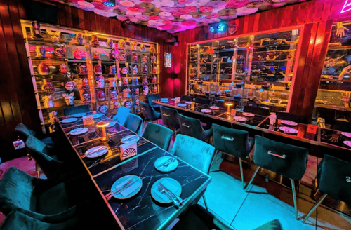Umbrella-Ceiling Rooftop Bar With City Views for Cocktail Parties