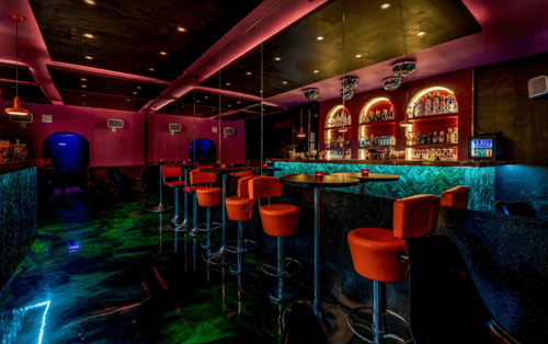 Captivating Retro-Chic Bar Featuring Unique Drinks and Disco Decor